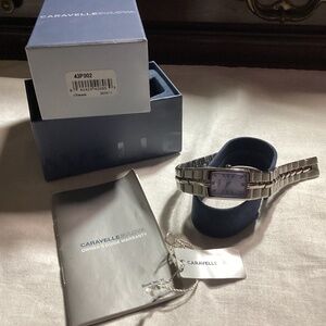 Caravelle By Bulova Ladies Watch. 4 DIAMONDS